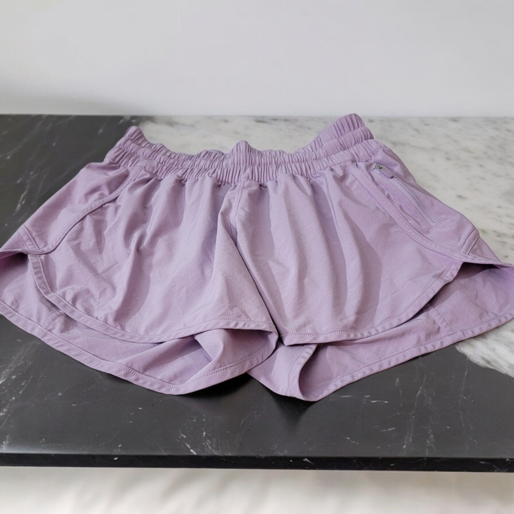 Lululemon's woman size 10 workout shorts with side zipper and drawstring